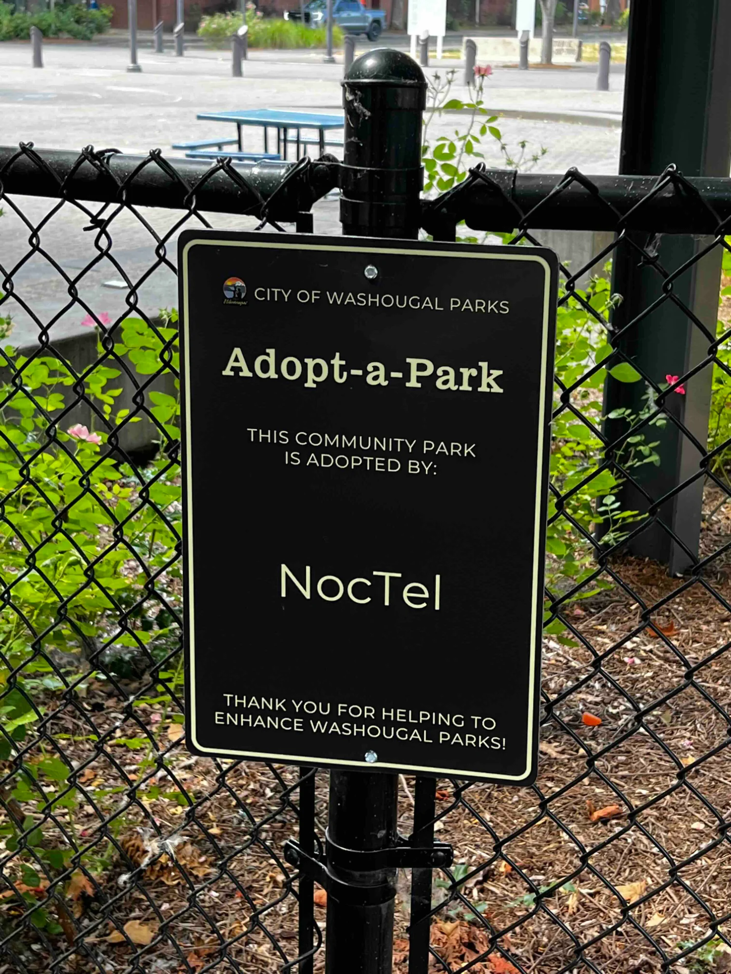 NocTel Adopt-a-Park sign at Reflection Plaza